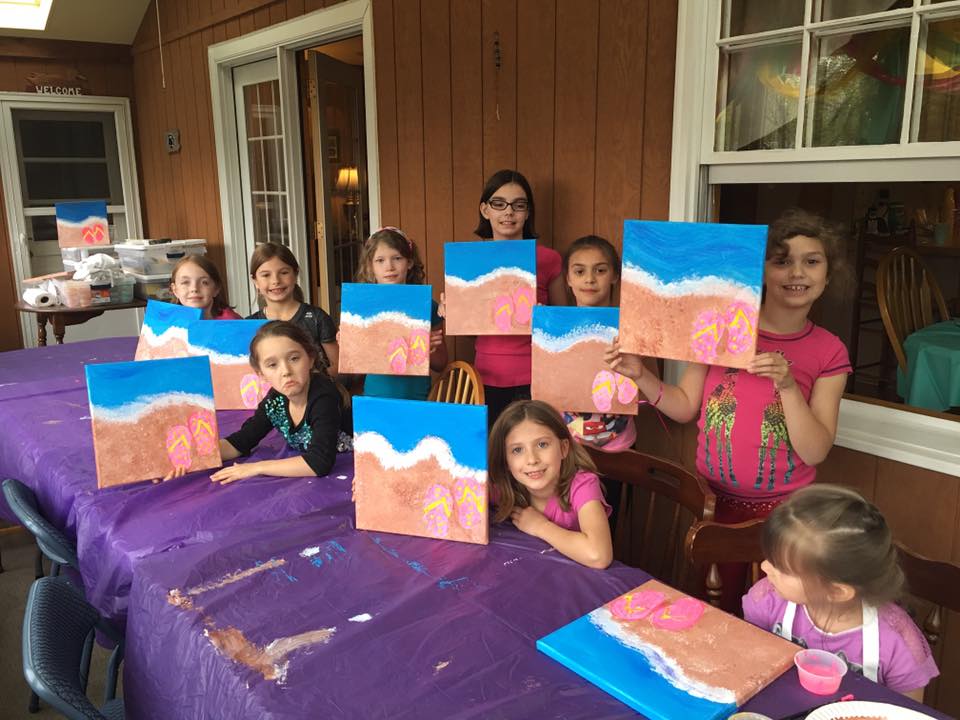 Paint & Craft Experiences, Kids showing their art